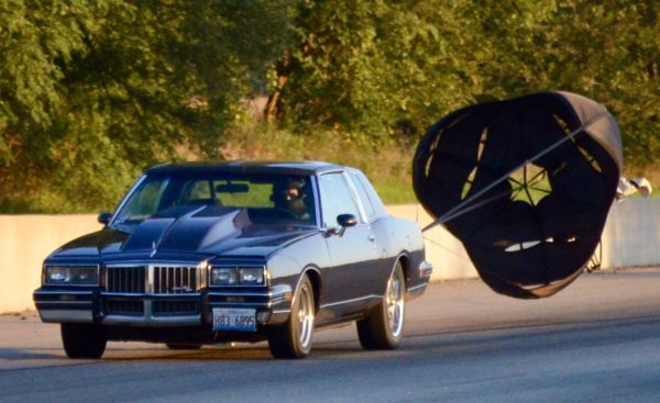 open parachute on back of car